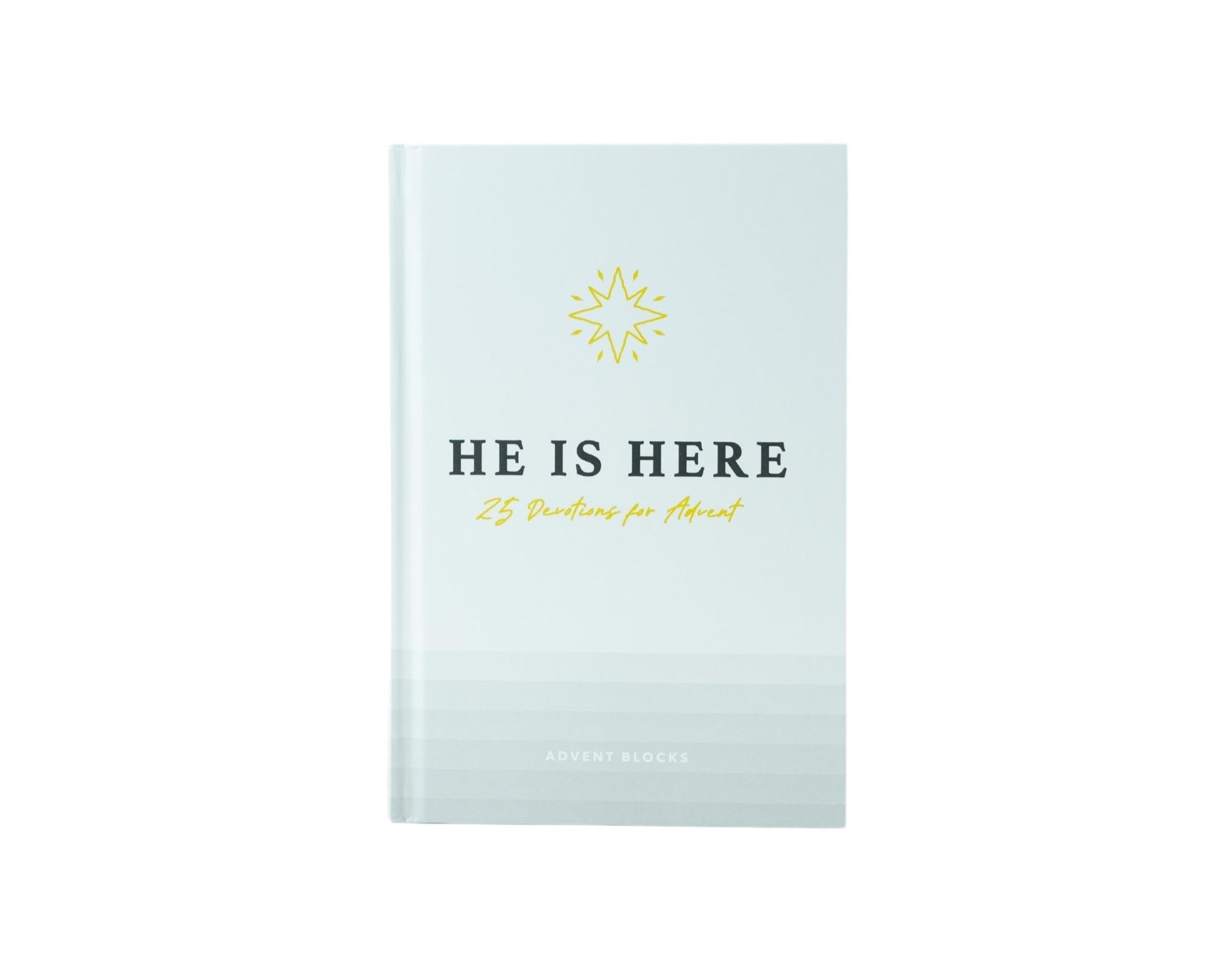 Book titled 'He Is Here' with a white cover on a white background